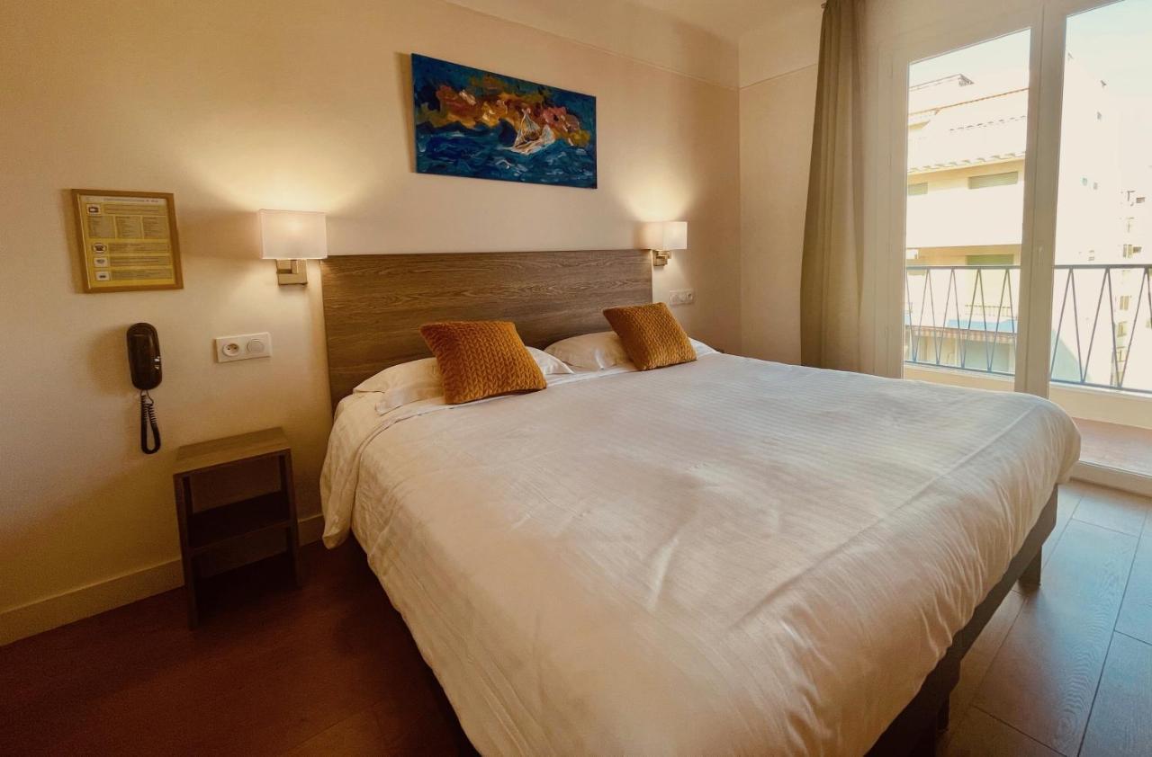 Hotel Courbet Juan-les-Pins Exterior foto