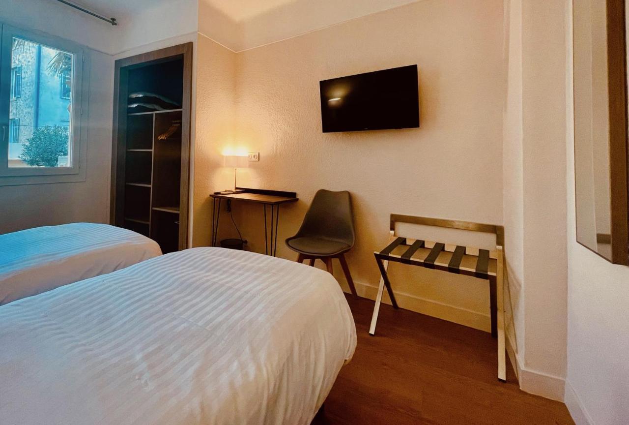 Hotel Courbet Juan-les-Pins Exterior foto