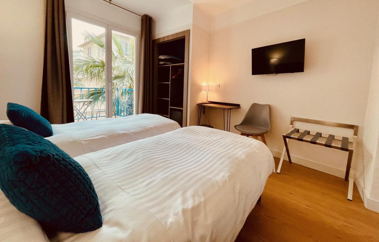 Hotel Courbet Juan-les-Pins Exterior foto
