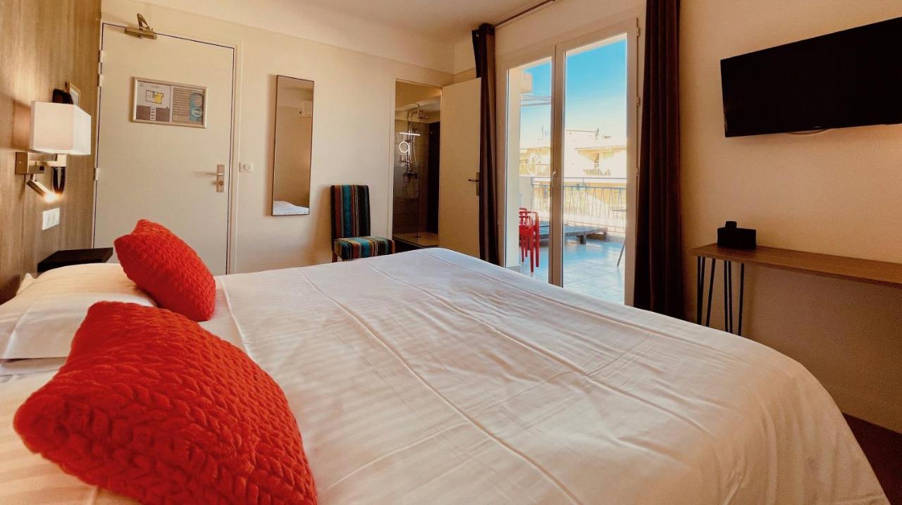Hotel Courbet Juan-les-Pins Exterior foto